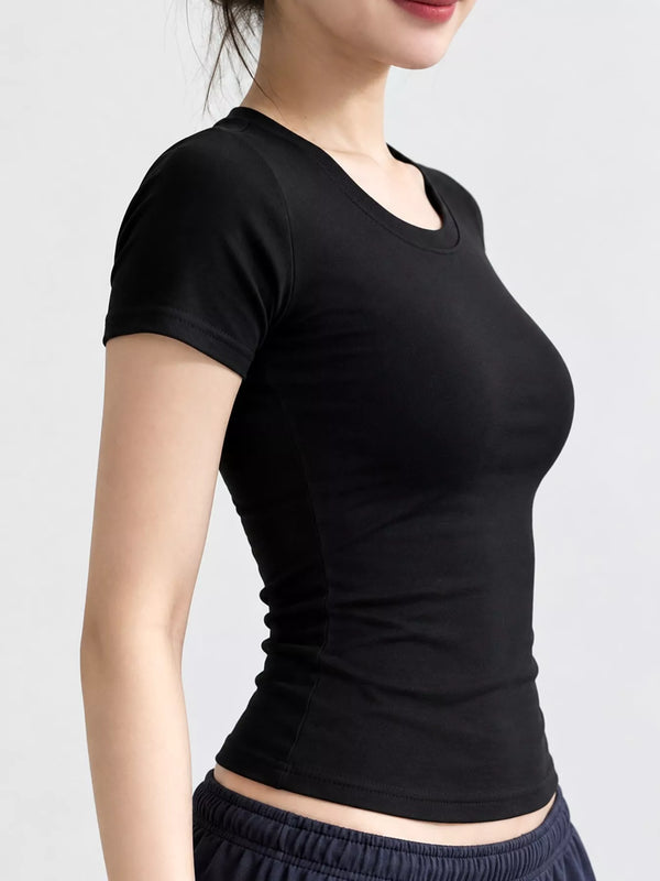Black fitted crew-neck T-shirt, side view on model