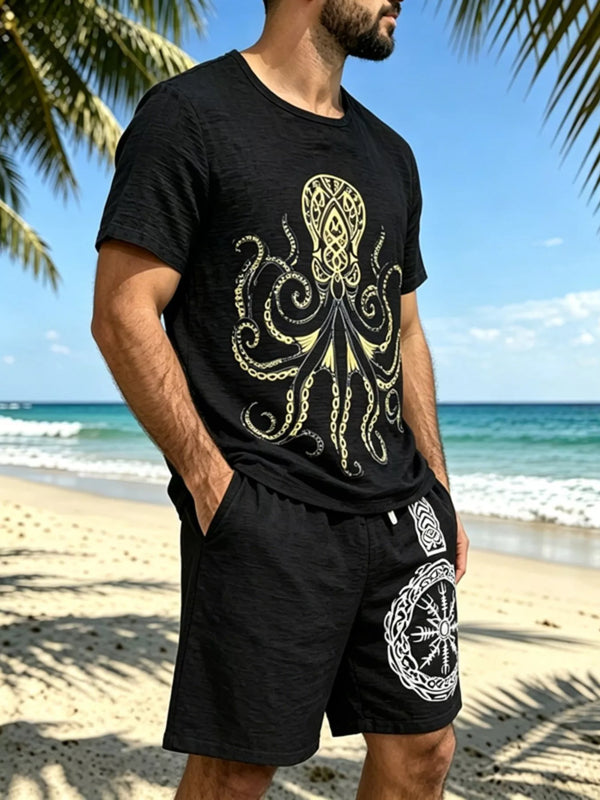 Black graphic tee and shorts set shown at an angle, with octopus print on the shirt and emblem on the shorts.