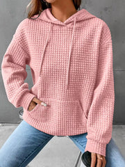 Pink textured hoodie with drawstring hood and front pocket