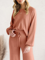 Close front view of rust-colored lounge top and drawstring waist