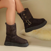 Gray buckle boots worn with skirt