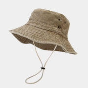 Side view of camel bucket hat with wide brim and chin cord