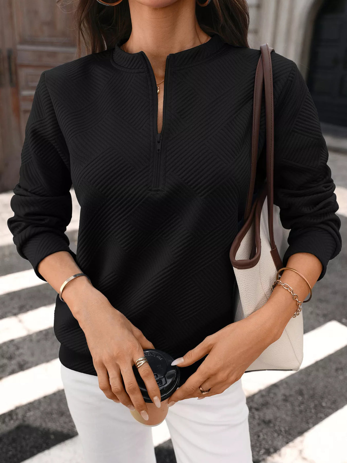 Model wearing the sweatshirt from the side