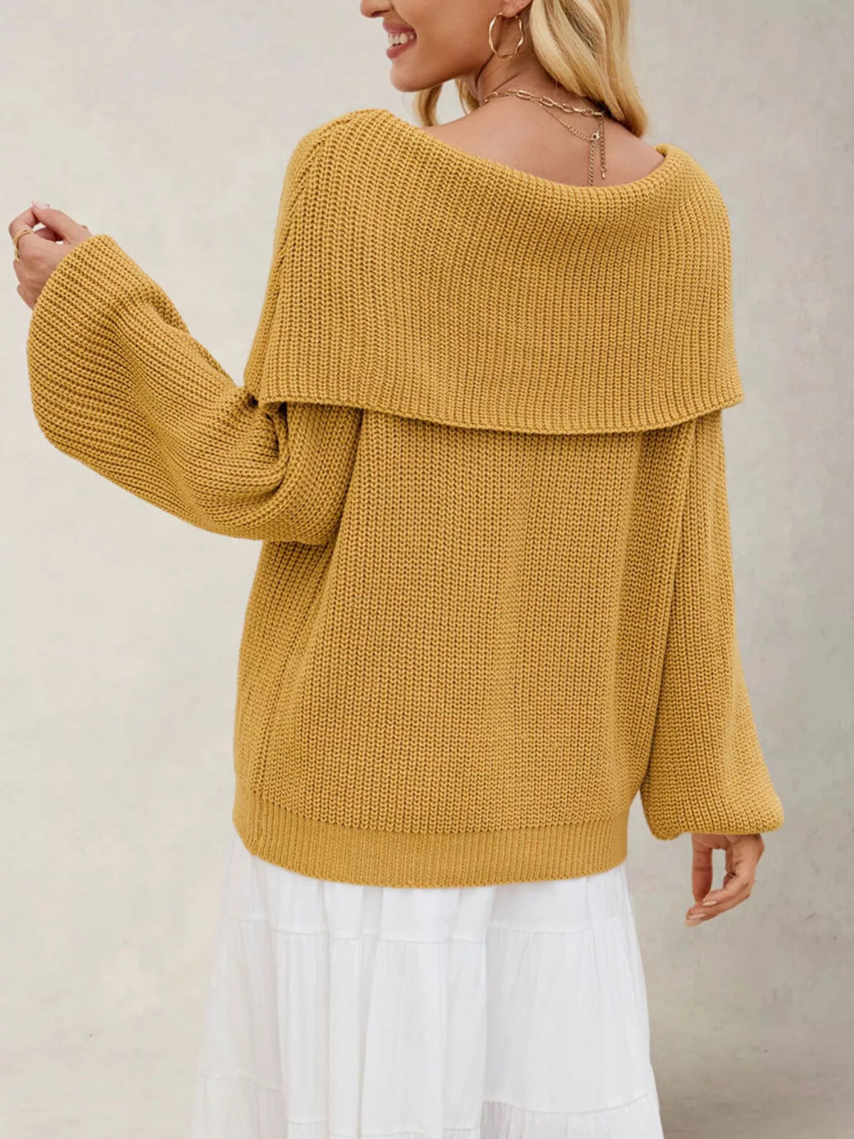 Back view of mustard off-shoulder sweater