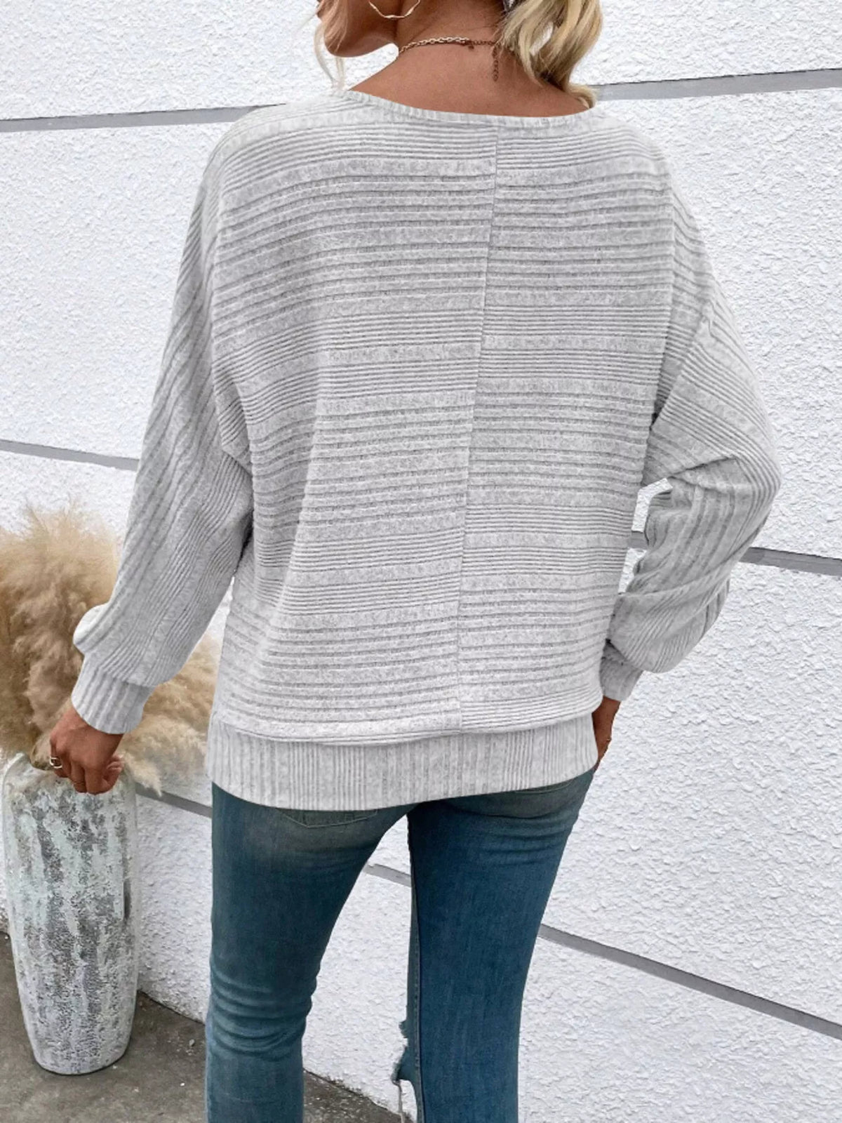 Women’s ribbed round-neck long-sleeve top in white back view