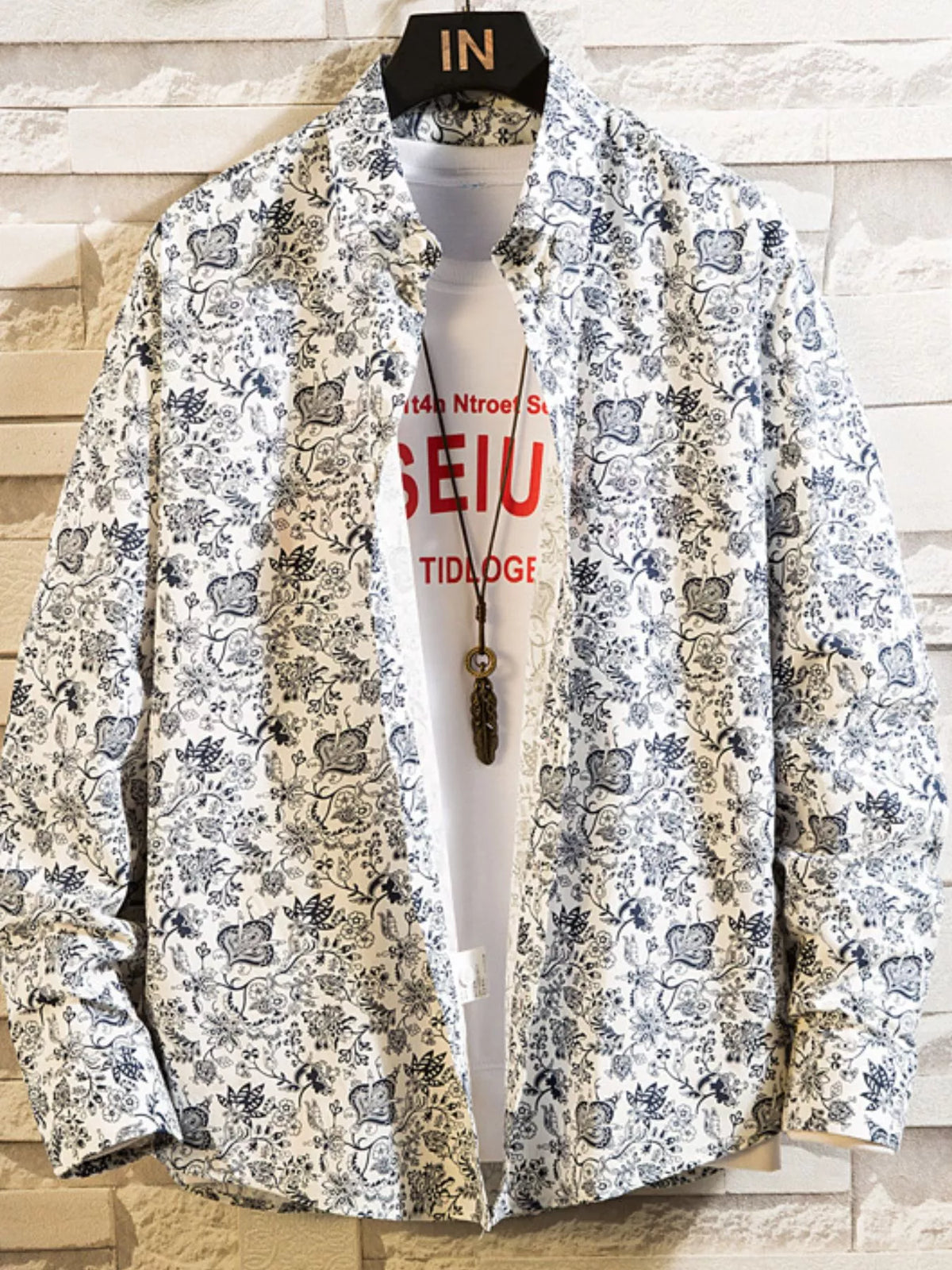White shirt with small gray floral print, front view