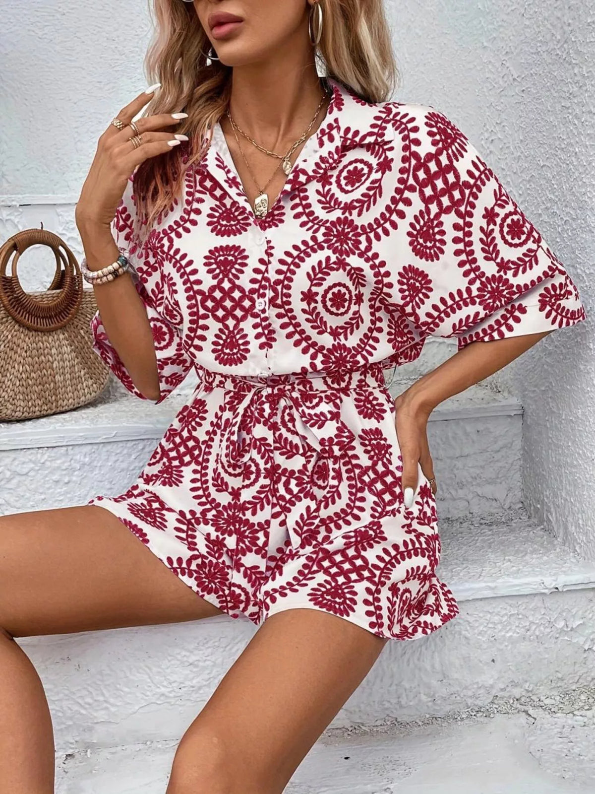 Women's printed tie-waist button-front romper, red-and-white print back view