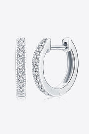 Silver-tone hoop earrings with clear stones along the front, shown open and closed