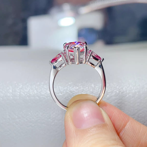 Rear view of the pink teardrop ring showing the raised stone setting and silver band