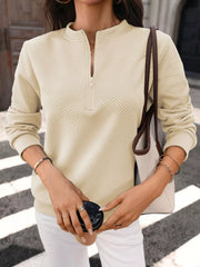 Close view of zipper and collar