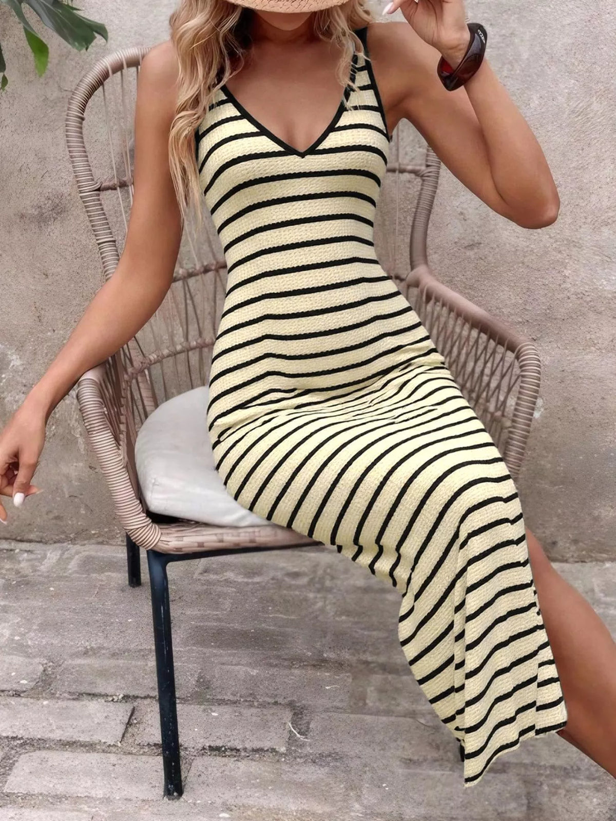 Close view of striped ribbed knit and dress neckline
