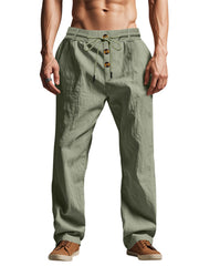 Olive-gray drawstring pants with button front, modeled with brown shoes