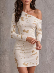 Three-quarter view of the cream long-sleeve one-shoulder bodycon dress