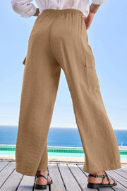 Back view of tan wide-leg utility trousers