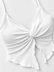 Close-up of twisted front detail on white cami