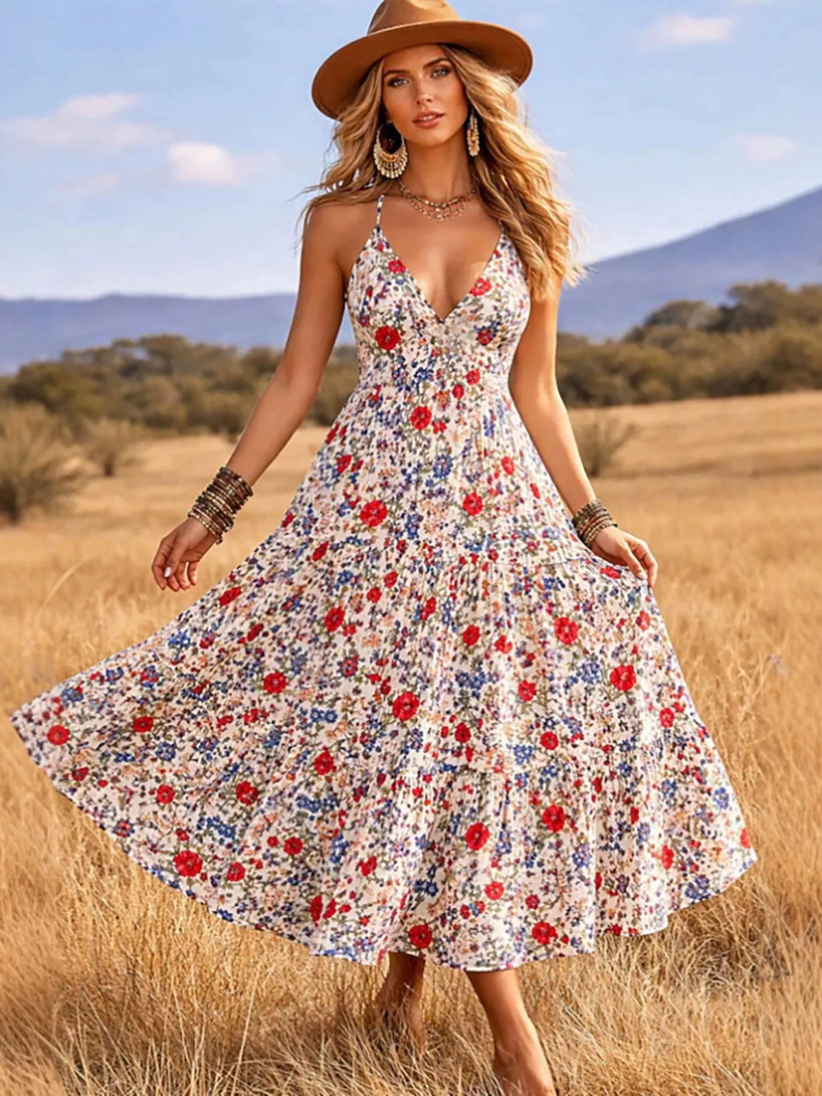 White floral V-neck midi dress with thin straps and tiered skirt, front view