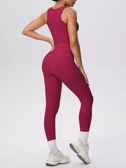 Pink tank and matching leggings in a front three-quarter view