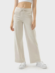 Blue pants with drawstring waist and pockets, front view