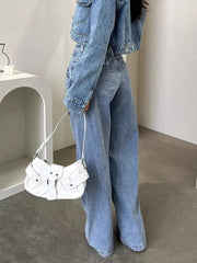 Light blue cargo jeans shown from the side with wide legs