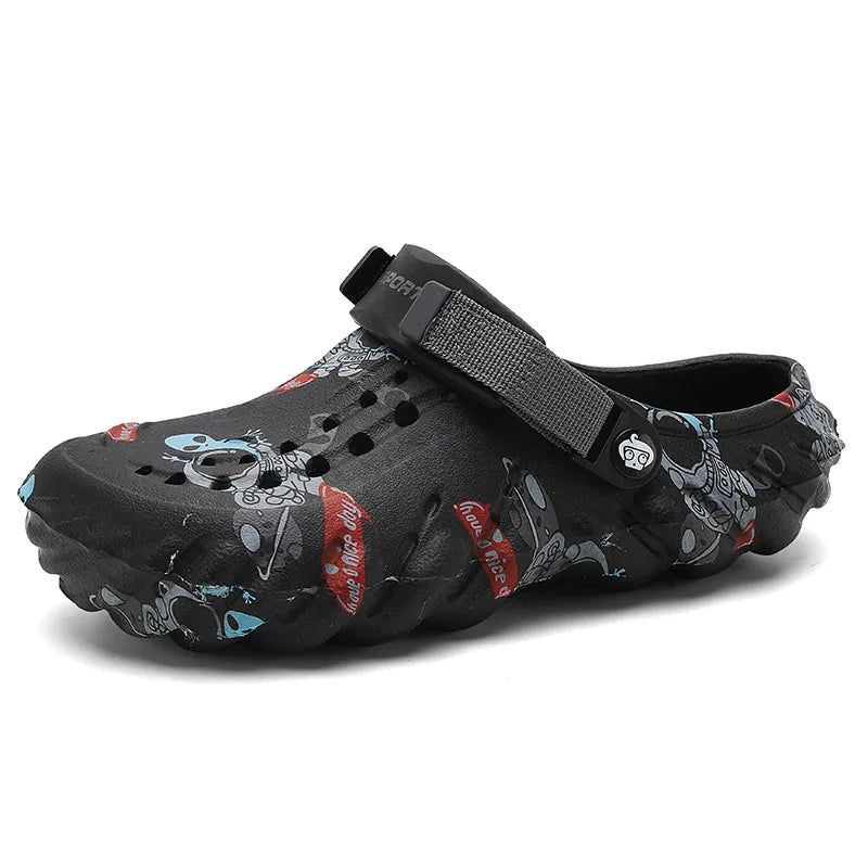Black graffiti-print clog with rounded toe and textured sole, product view