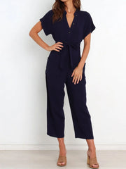 Women's notched short-sleeve tie-waist jumpsuit, navy front view