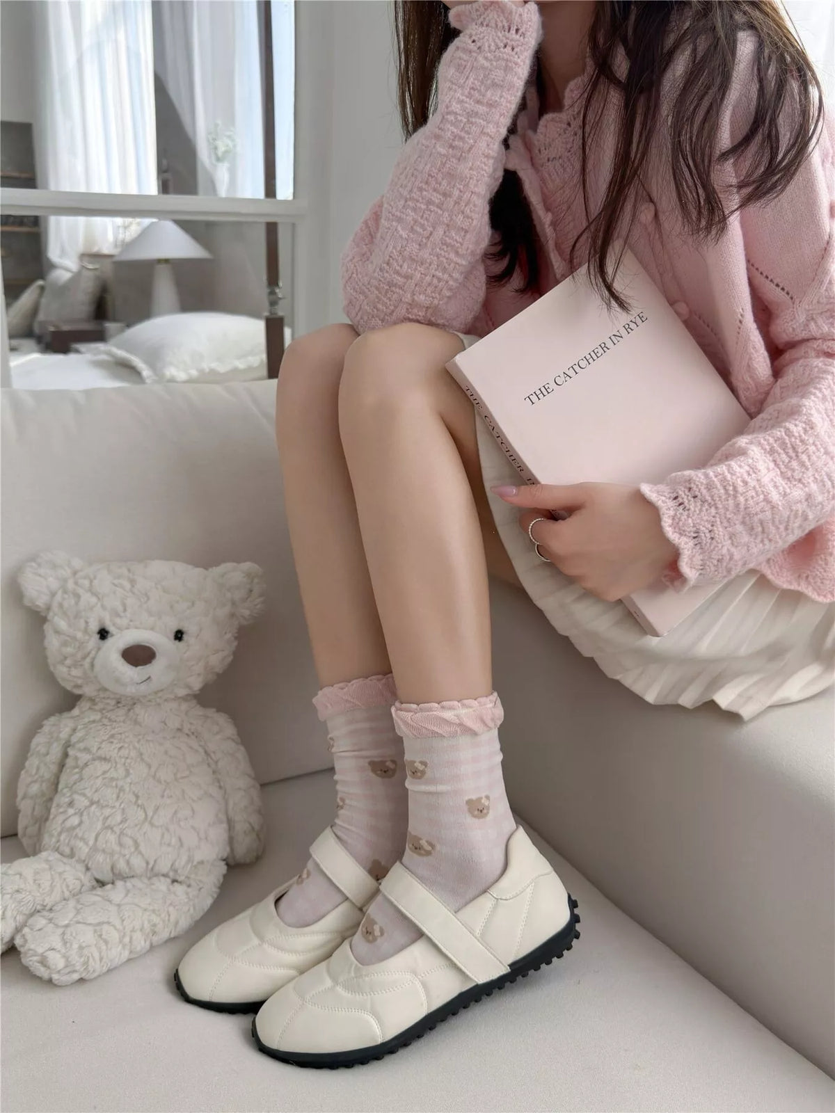 Pink socks worn with sneakers