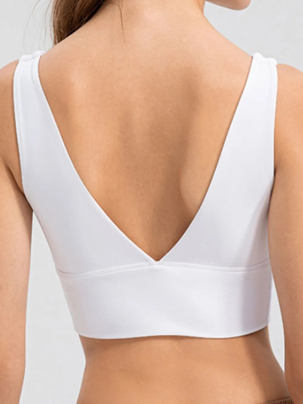 Black wide-strap cropped tank with scoop neckline, front view