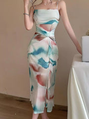 Front view of the sleeveless watercolor-print midi dress with gathered waist and straight skirt.