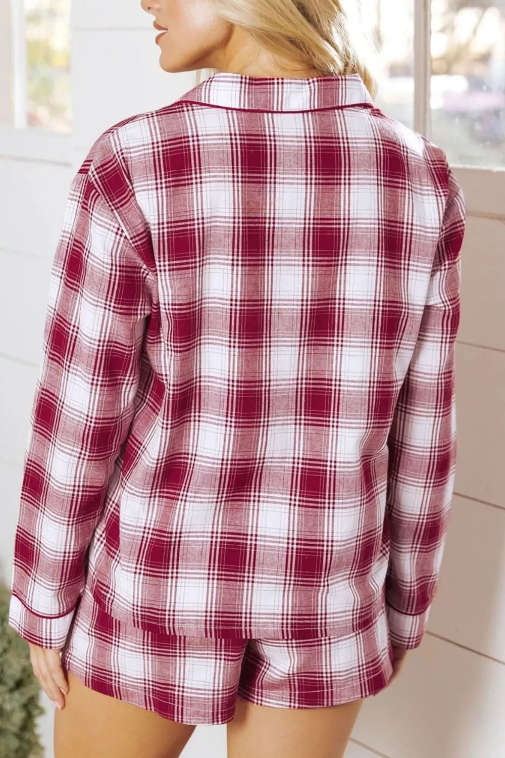 Back view of red plaid pajama shirt and matching shorts