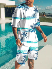 Model wearing white matching shirt and shorts with blue palm tree print