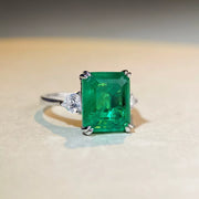 Green centre stone zircon ring shown at an angle.