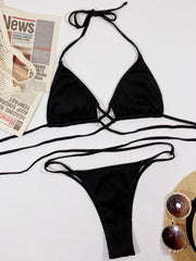 Close-up of brown bikini bottoms and crossing ties