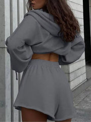 Rear view of gray zip hoodie and matching shorts
