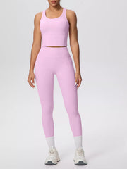 White activewear set shown from the side with a phone in pocket