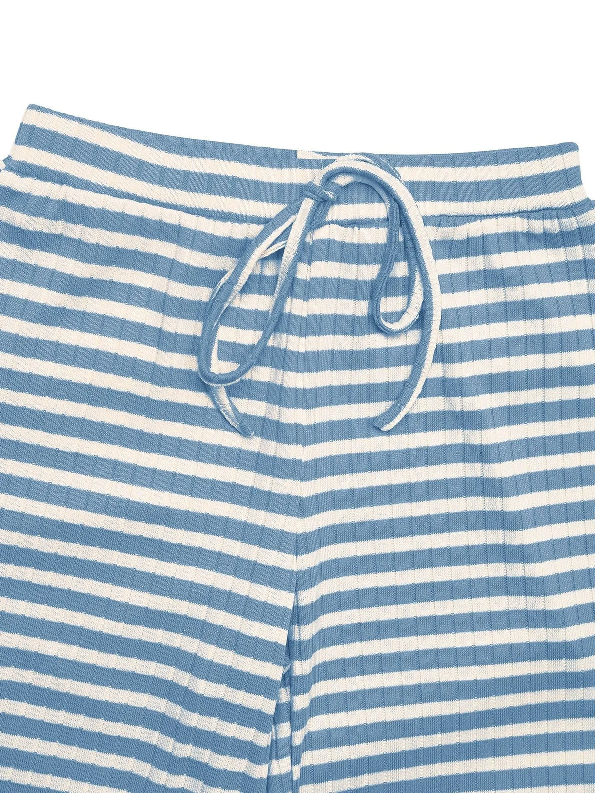 Detail of ribbed blue-and-white striped fabric and pant waistband