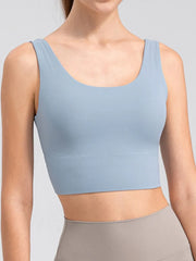Light blue wide-strap cropped tank with scoop neckline, front view