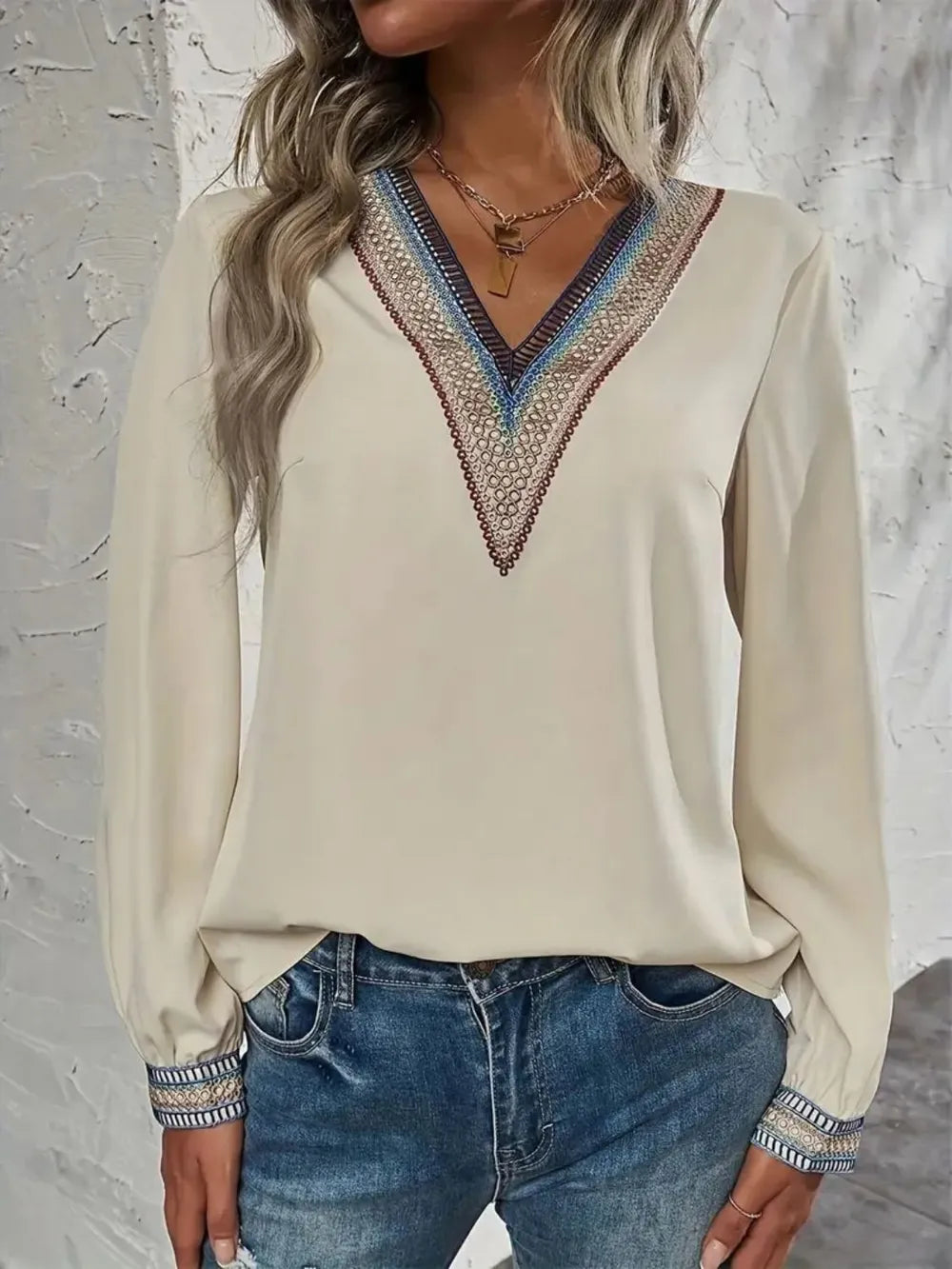 Contrast V-neck long-sleeve blouse in cream front view