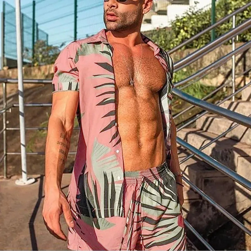 Model wearing pink tropical-print shirt and shorts