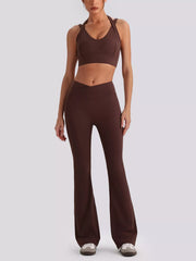 Back view showing fit of seamless criss-cross v-neck tank and leggings active set