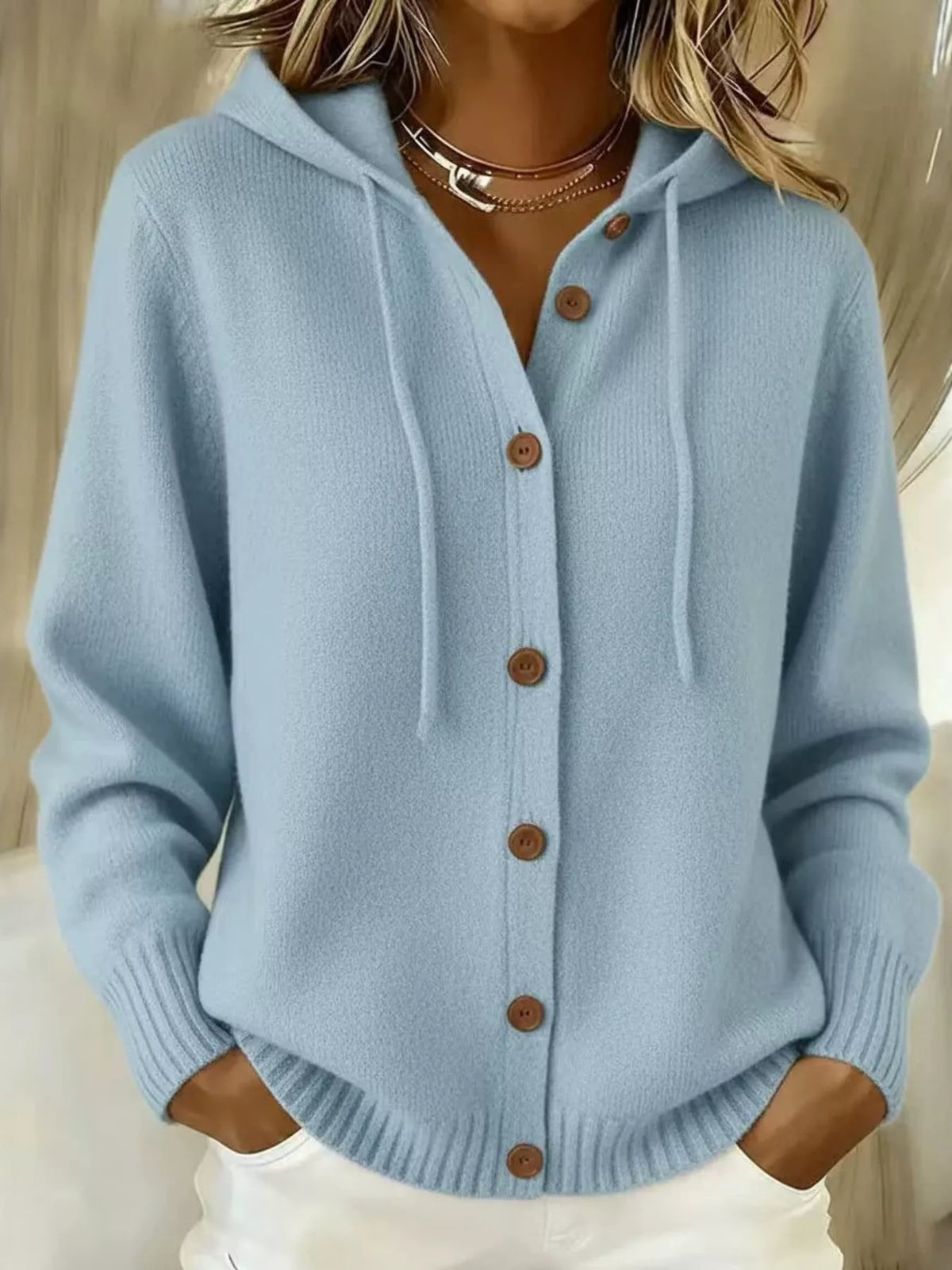 Light blue hooded button-front knit cardigan with brown buttons, front view