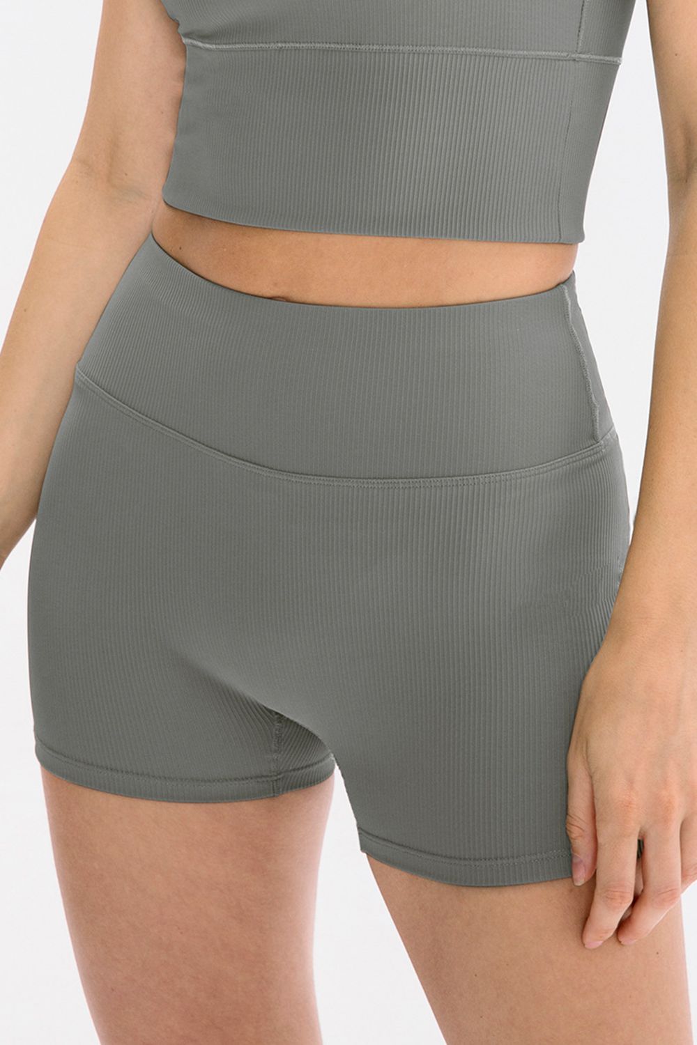 Rear view of white ribbed high-waisted shorts
