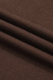 Folded brown tee fabric shown in close-up
