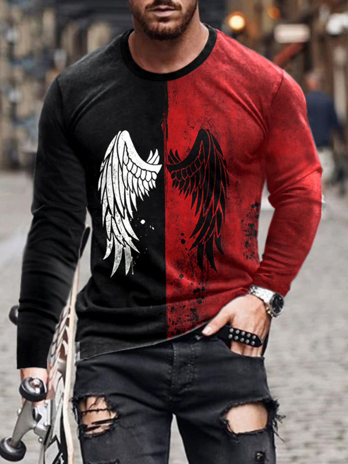 Model wearing split black and red long-sleeve shirt with large wing graphic