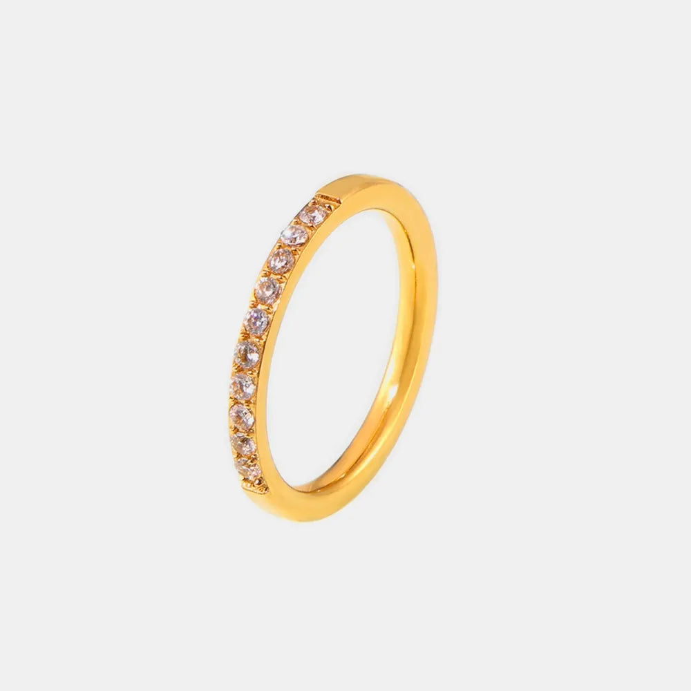 Gold-tone titanium steel ring with a slim band of clear zircon stones