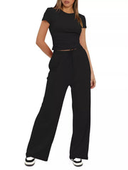 Front view of the black tank and wide-leg pants set.