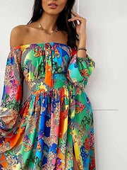 Side view of the blue multicolor off-shoulder maxi dress with a flowing skirt.