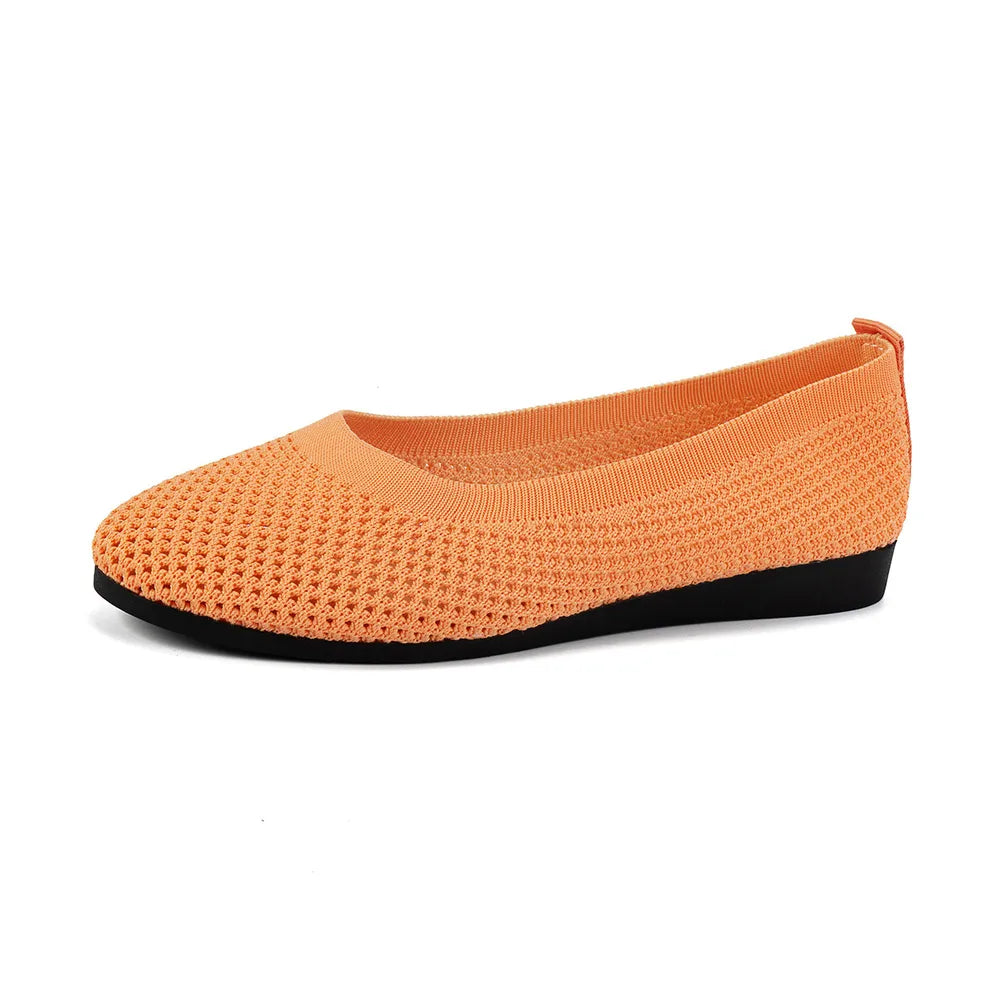 Orange mesh flat slip-on in side profile