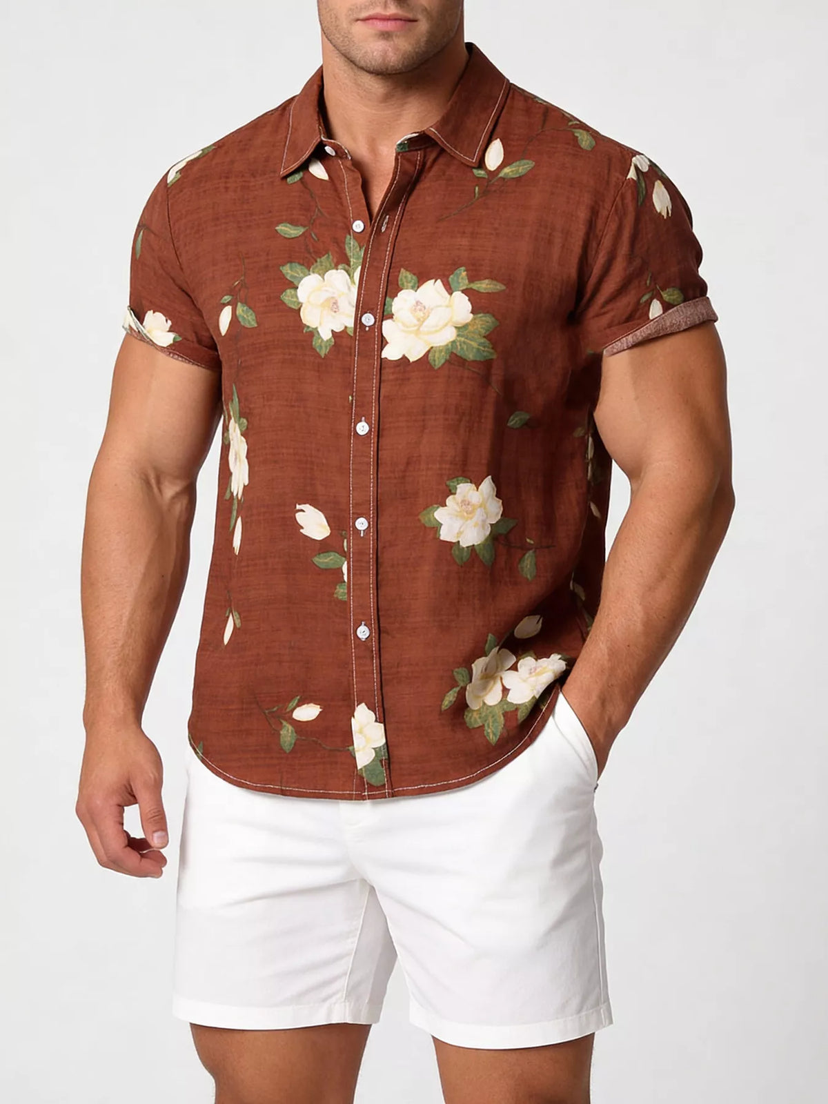 Model wearing a rust-brown floral short-sleeve shirt