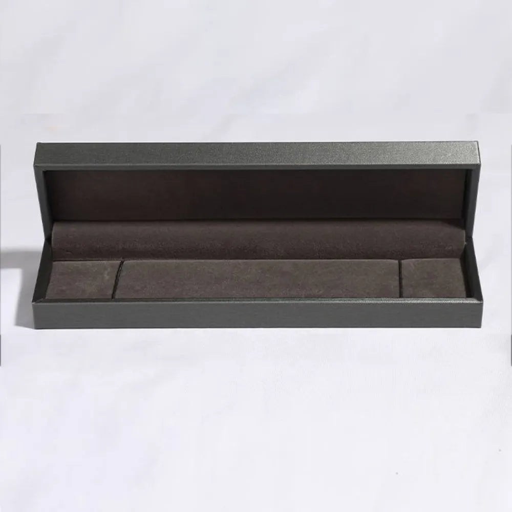 Empty presentation box shown beside bracelet listing