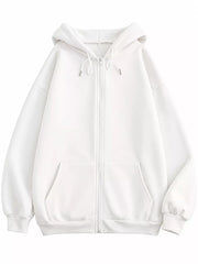 Full front view of the white oversized hoodie showing its zip closure and roomy sleeves